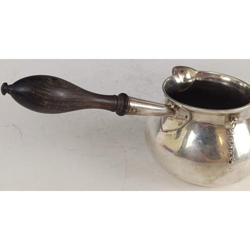 144 - A George III silver brandy pan and lid, with a wooden handle, London 1775, 14.2 ozt all in, 25 cm wi... 