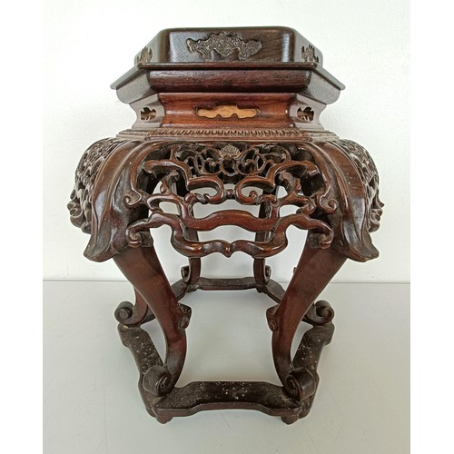 933 - A small Chinese carved hardwood stand, 30.5 cm high