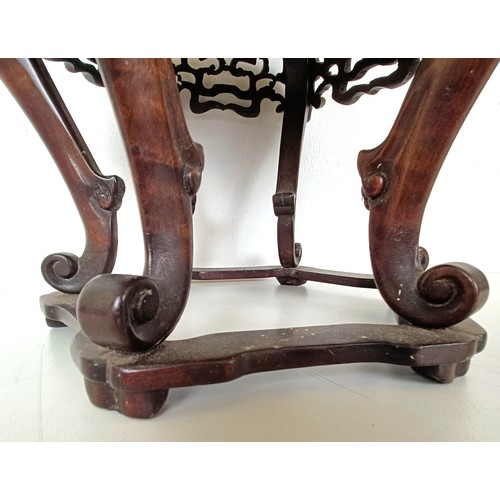 933 - A small Chinese carved hardwood stand, 30.5 cm high