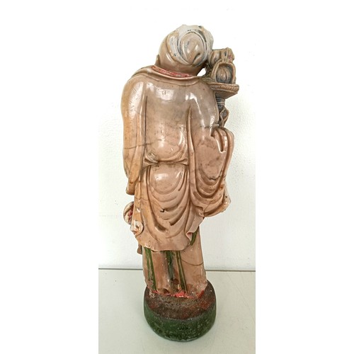 958 - A Chinese hardstone carving of a man, 25 cm high