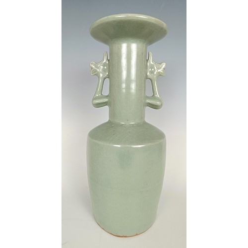 986 - A Chinese celadon vase, in a wooden case, 27 cm high