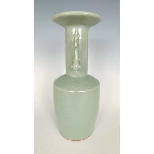 986 - A Chinese celadon vase, in a wooden case, 27 cm high