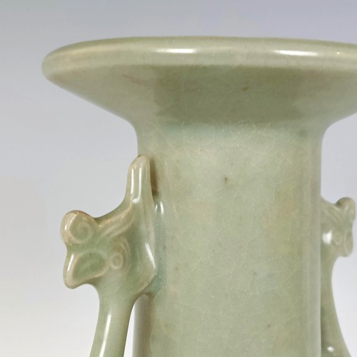 986 - A Chinese celadon vase, in a wooden case, 27 cm high