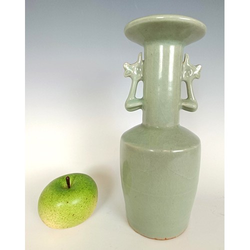 986 - A Chinese celadon vase, in a wooden case, 27 cm high