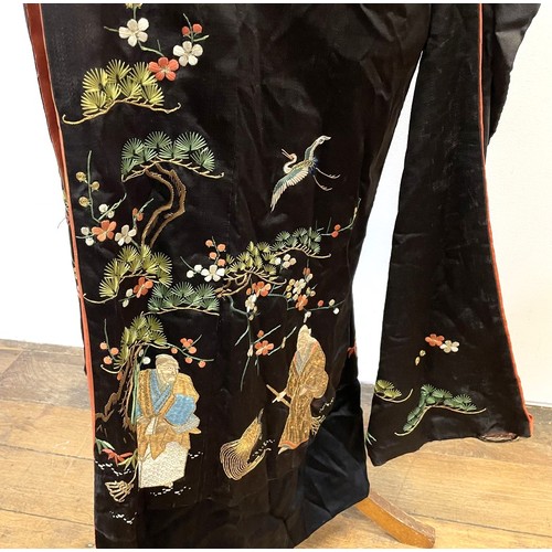 894 - A Chinese robe, decorated flowers