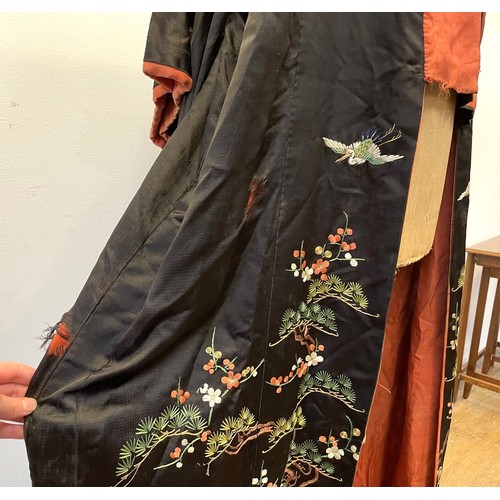 894 - A Chinese robe, decorated flowers