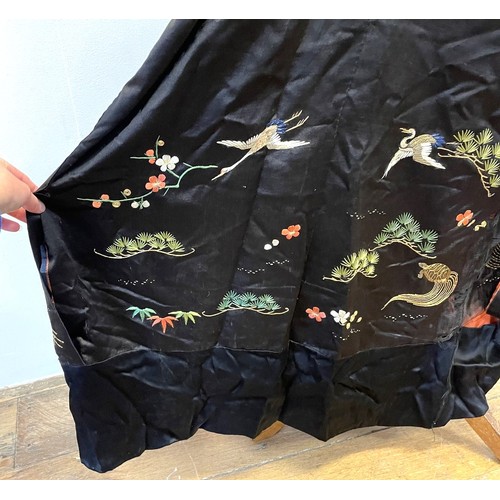 894 - A Chinese robe, decorated flowers