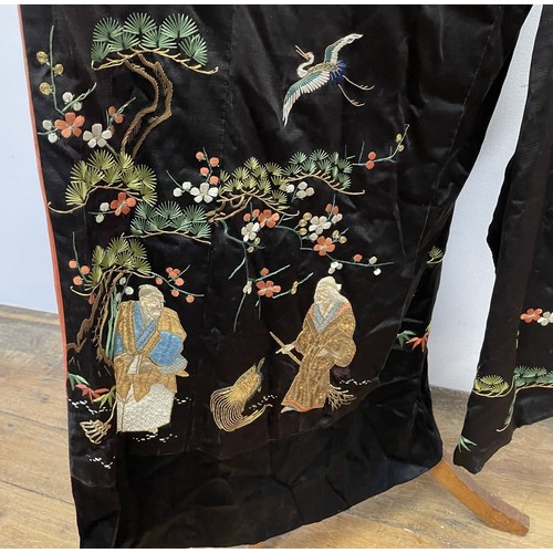 894 - A Chinese robe, decorated flowers