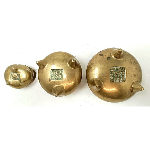 968 - A graduated set of three Chinese bronze censers, 13 cm diameter, 10 cm diameter, and 7 cm diameter, ... 