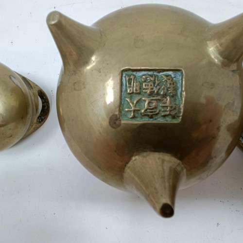 968 - A graduated set of three Chinese bronze censers, 13 cm diameter, 10 cm diameter, and 7 cm diameter, ... 