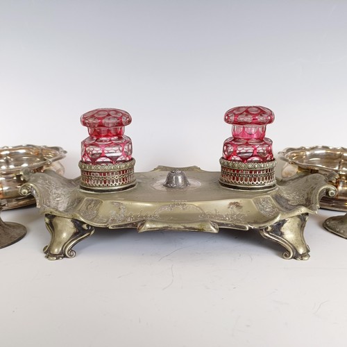 1 - A Victorian silver plated desk stand, with cased glass inkwells, a pair of bottle coasters and assor... 