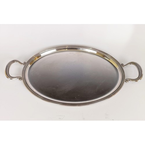 3 - A modern silver oval two handled tray, London 1995, 28.2 ozt, 49 cm wide...