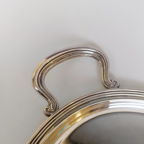 3 - A modern silver oval two handled tray, London 1995, 28.2 ozt, 49 cm wide...