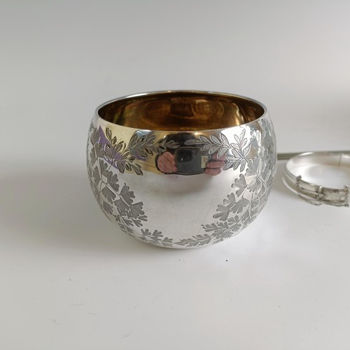 21 - A George V silver sugar bowl, 3.4 ozt, assorted silver plate, a silver bangle, and an open face pock... 