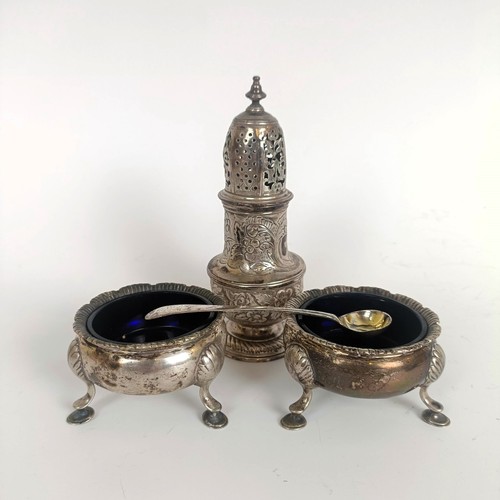 70 - A George III silver sifter, later engraved, 3.3 ozt and a pair of silver salts and a salt spoon, var...