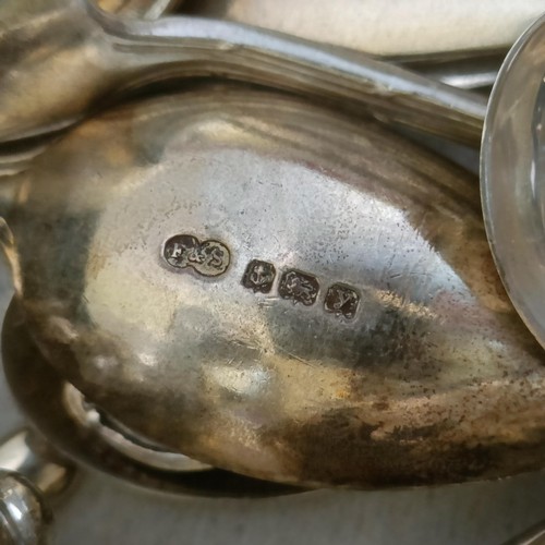 98 - A silver christening spoon and fork set, initialled, Sheffield 1935, cased, a silver jug, and other ... 