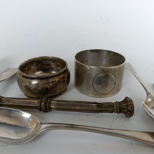 147 - Assorted silver spoons, napkin ring, and a pencil inset with a purple stone, 6.1 ozt, (all in)