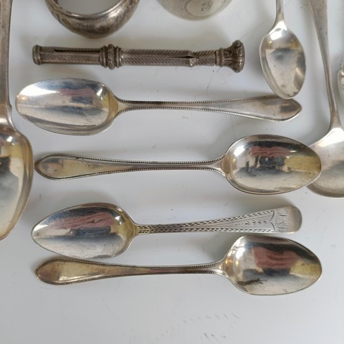 147 - Assorted silver spoons, napkin ring, and a pencil inset with a purple stone, 6.1 ozt, (all in)