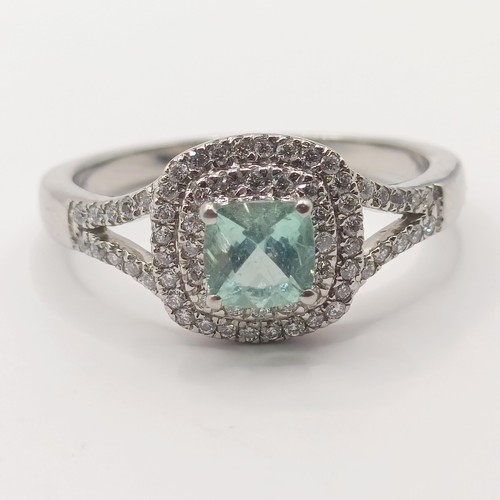 305 - A platinum, aquamarine and diamond rhapsody ring, ring size T