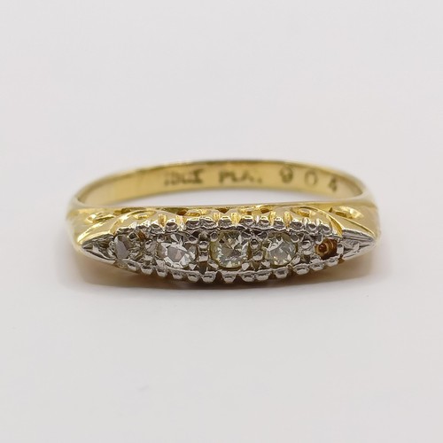 306 - An 18ct gold and diamond ring, ring size K