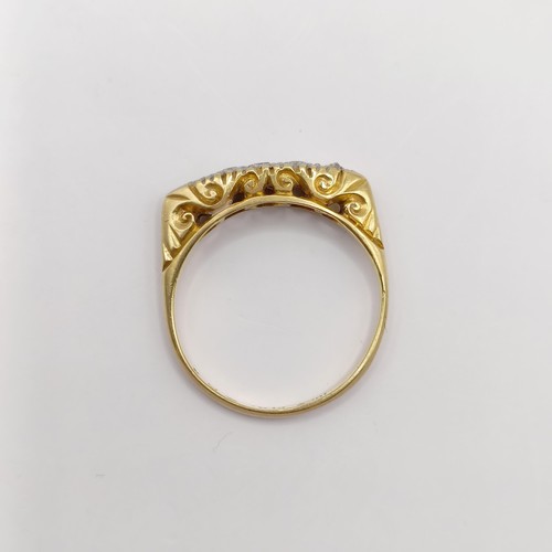 306 - An 18ct gold and diamond ring, ring size K