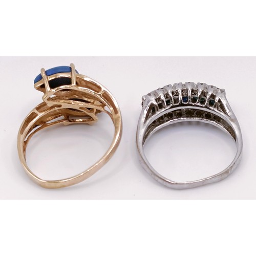 312 - A 14ct gold and blue hardstone ring, ring size P, and a silver and blue and white stone ring, ring s... 