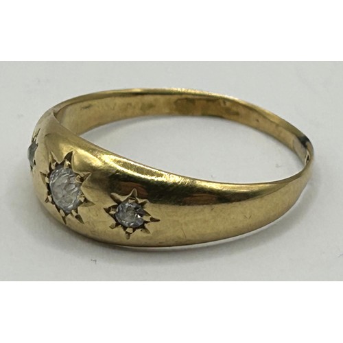 316 - A 9ct gold and diamond gypsy set ring...