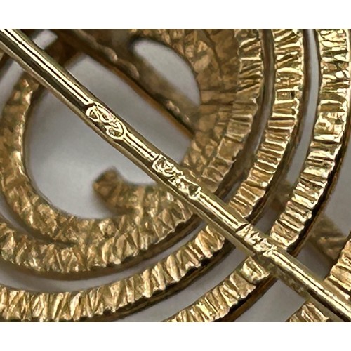 317 - A 20th century 9ct gold spiral brooch...