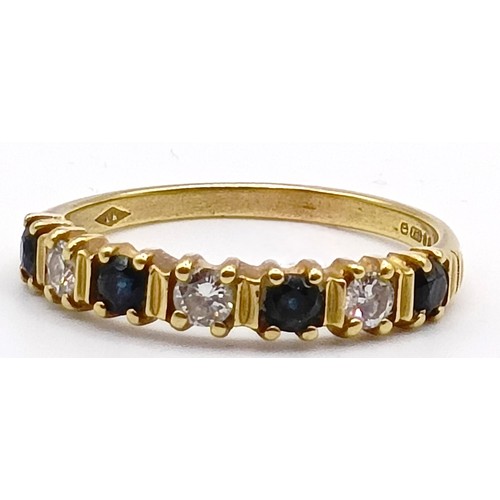 323 - An 18ct gold, sapphire and diamond half hoop ring, ring size Q...