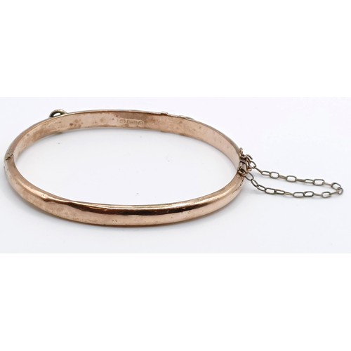 325 - A 9ct gold bangle, 6.1 g...