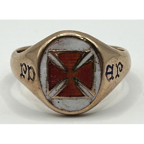 328 - A 9ct gold and enamel signet ring, decorated a cross, ring size P