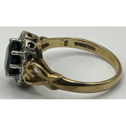 330 - A 9ct gold, white and blue stone ring, ring size N