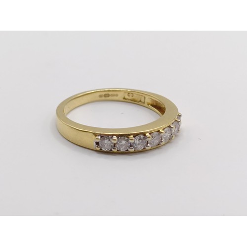 333 - An 18ct gold and diamond half hoop ring, ring size O