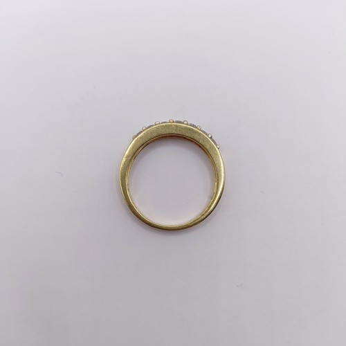 333 - An 18ct gold and diamond half hoop ring, ring size O