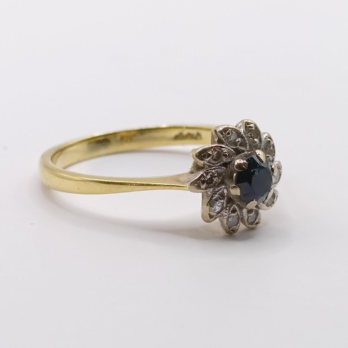 338 - An 18ct gold, diamond and sapphire cluster ring, ring size N...