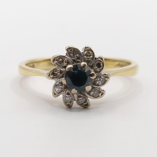 338 - An 18ct gold, diamond and sapphire cluster ring, ring size N...