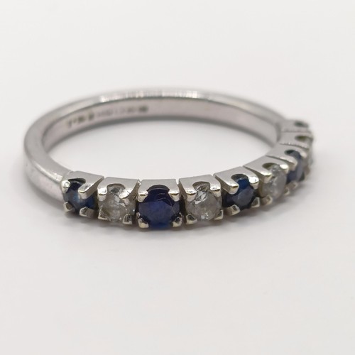 340 - A platinum, diamond and sapphire half hoop ring, ring size M