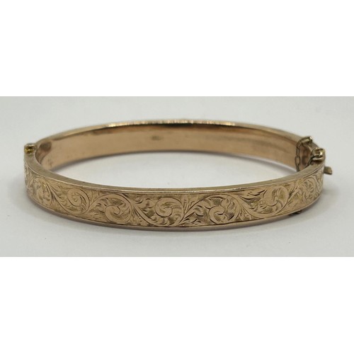 346 - A 9ct gold bangle, 8.9 g...