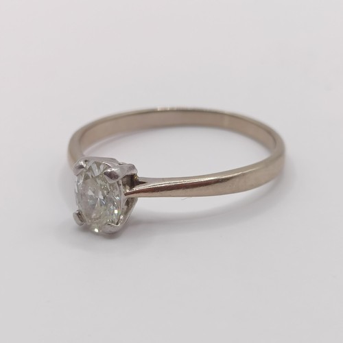 349 - A diamond solitaire ring, ring size M...