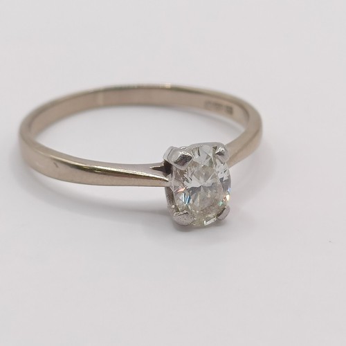 349 - A diamond solitaire ring, ring size M...