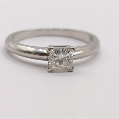 350 - A platinum and princess cut solitaire diamond ring, ring size K