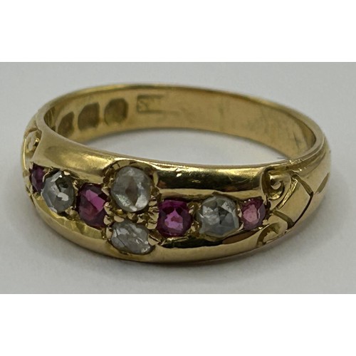 353 - An early 20th century 18ct gold, ruby and diamond gypsy set ring, ring size L, in a vintage ring  bo... 