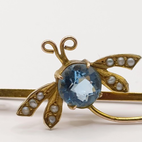 355 - A gold and blue stone bar brooch