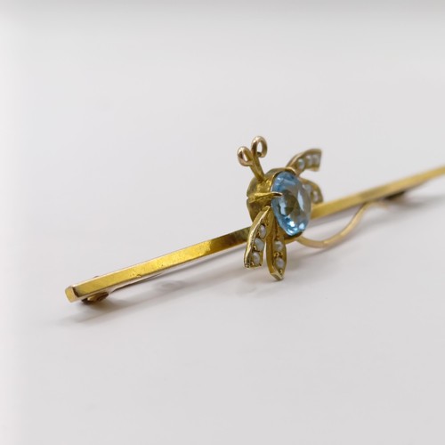 355 - A gold and blue stone bar brooch