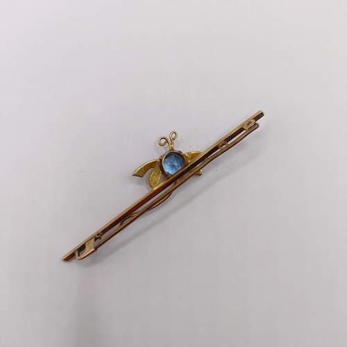 355 - A gold and blue stone bar brooch