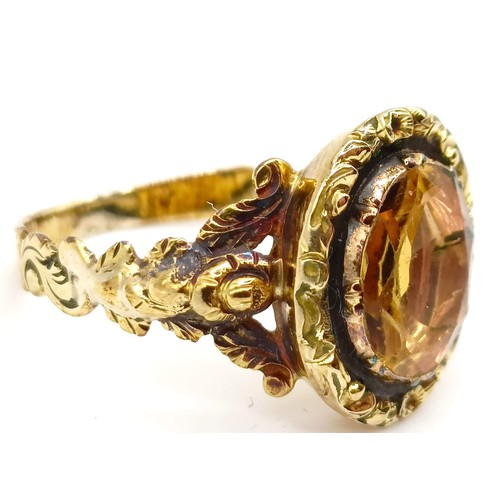 358 - A yellow coloured metal cocktail ring, ring size M...