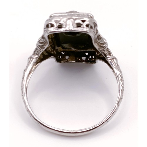 364 - An Art Deco white gold, onyx and diamond ring, ring size N