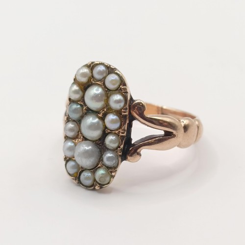 368 - A yellow coloured metal and seed pearl panel ring, probably 19th century, ring size K