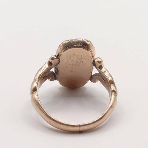 368 - A yellow coloured metal and seed pearl panel ring, probably 19th century, ring size K