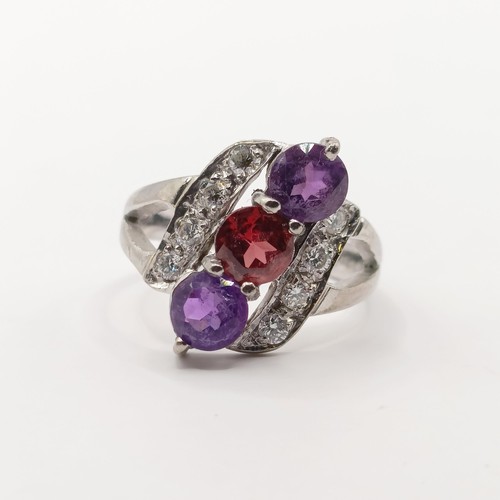 369 - An 18ct white gold, diamond and multi-coloured stone ring, ring size J